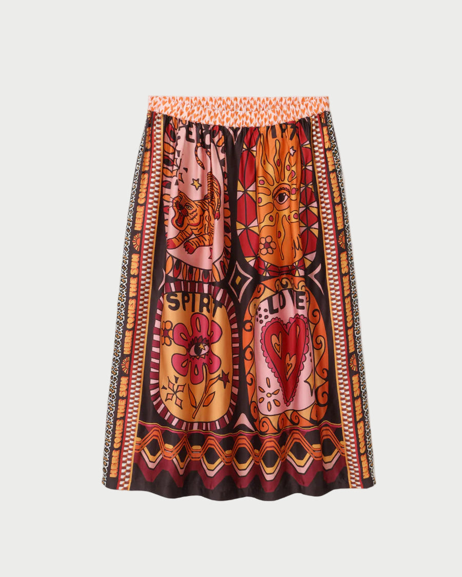Colorful patterned skirt on a light gray background