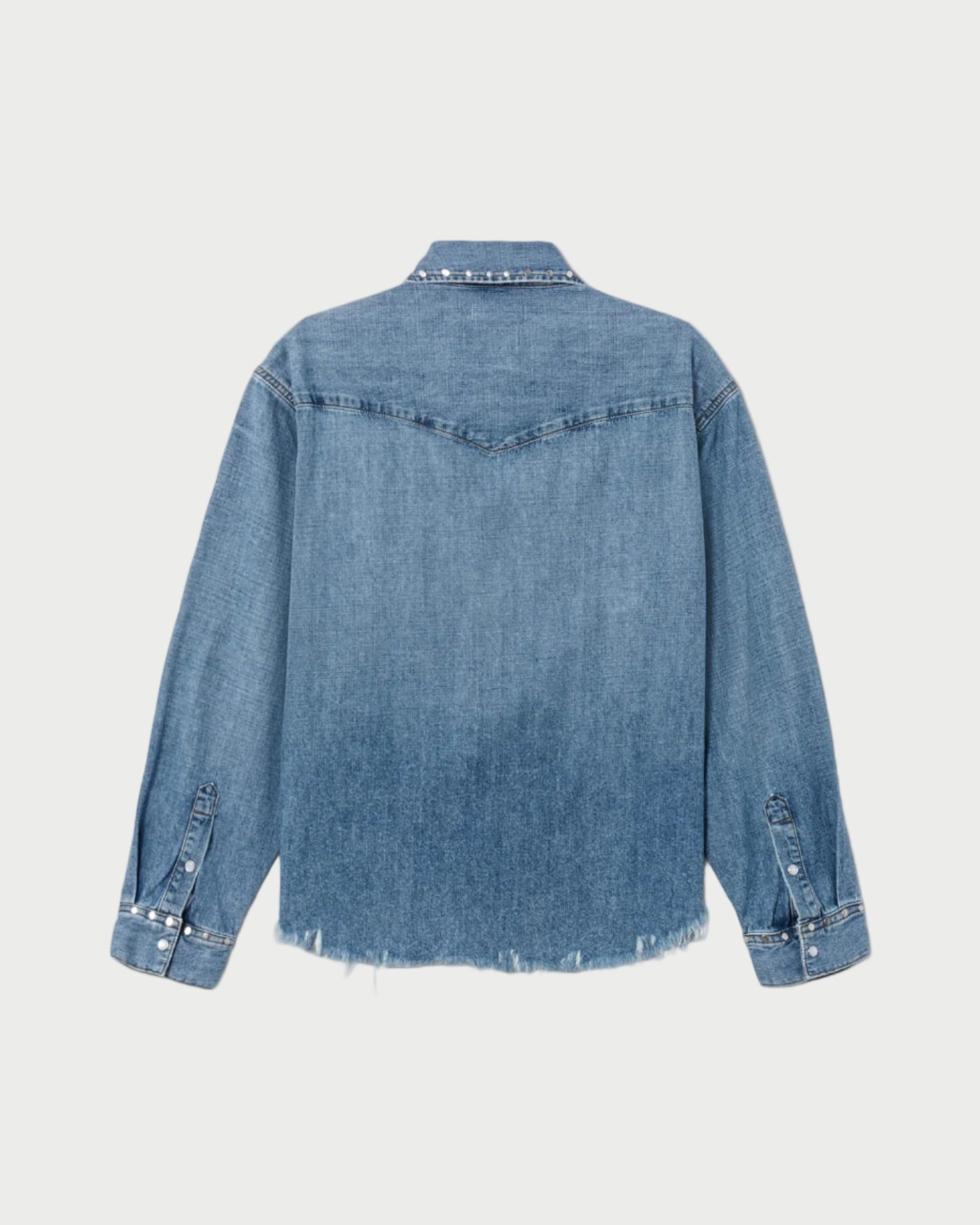 Blue denim jacket on a light blue background