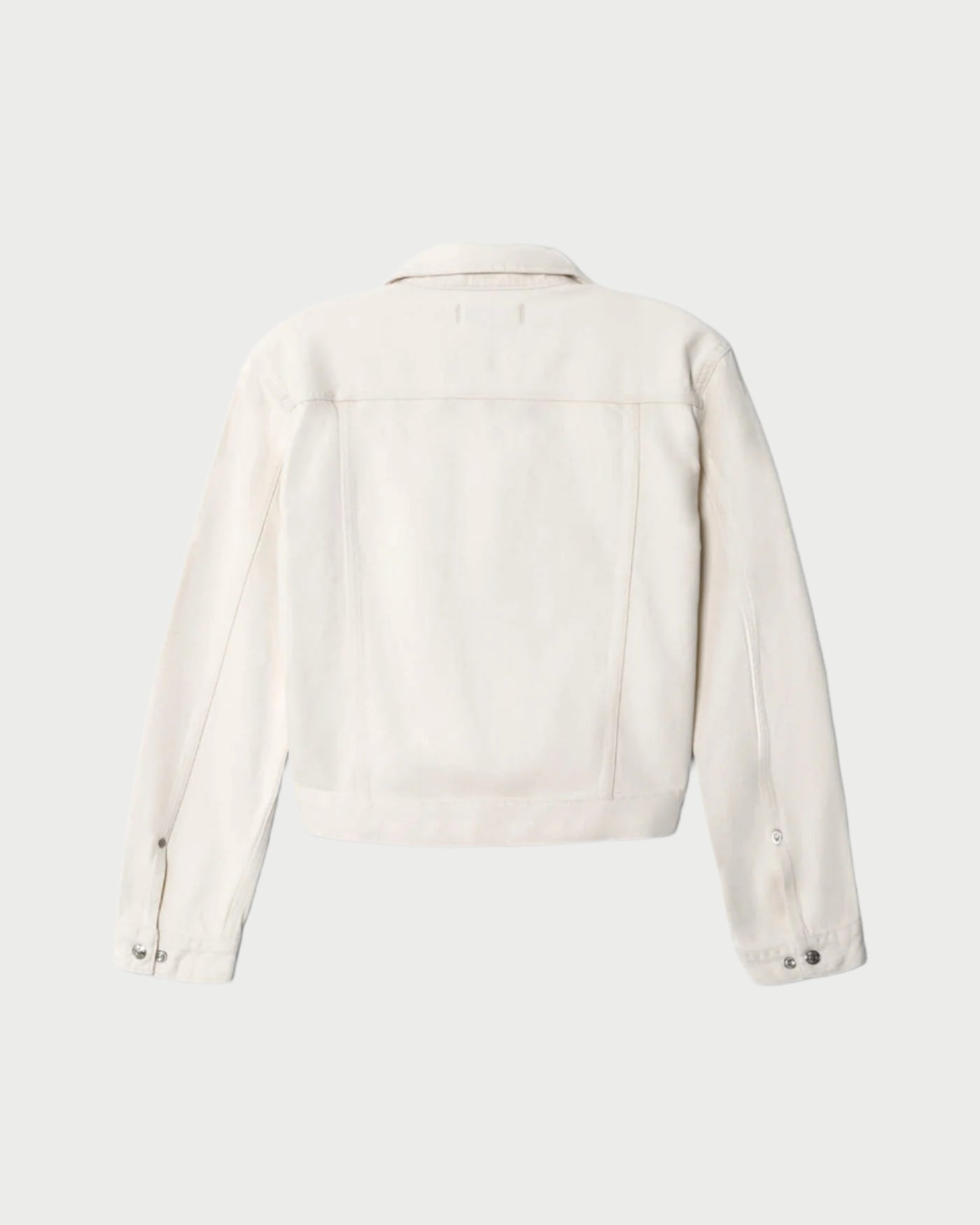 Back view of the Baby Trucker Jacket by RE/DONE in summery ivory, featuring long sleeves, a pointed collar, and buttoned cuffs, shown against a light gray background.