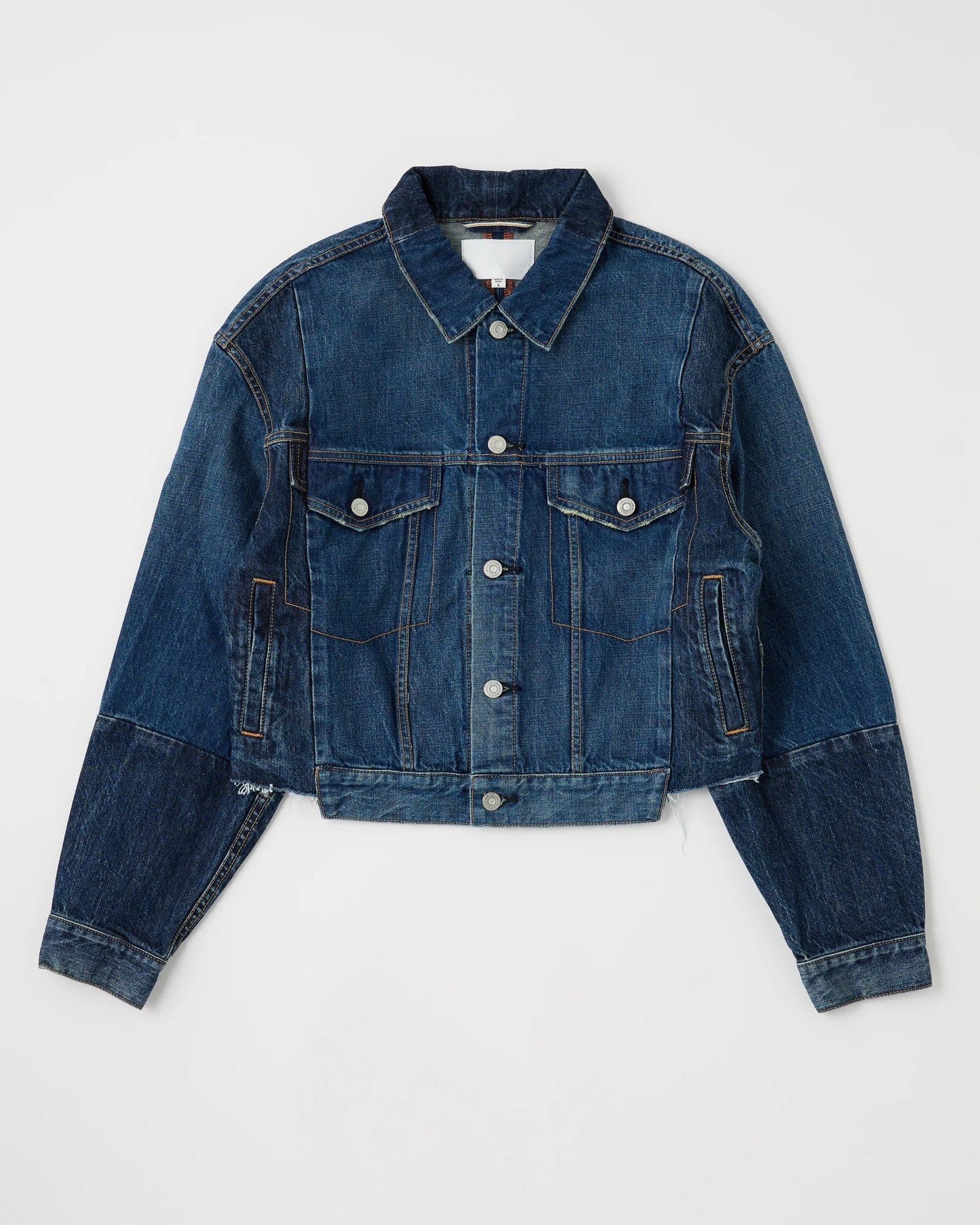 The Dover Two Tone Jean Jacket by Moussy features a cropped fit, stylish two-tone wash, button closures, flap chest pockets, and long sleeves. Shown laid flat on a white background.