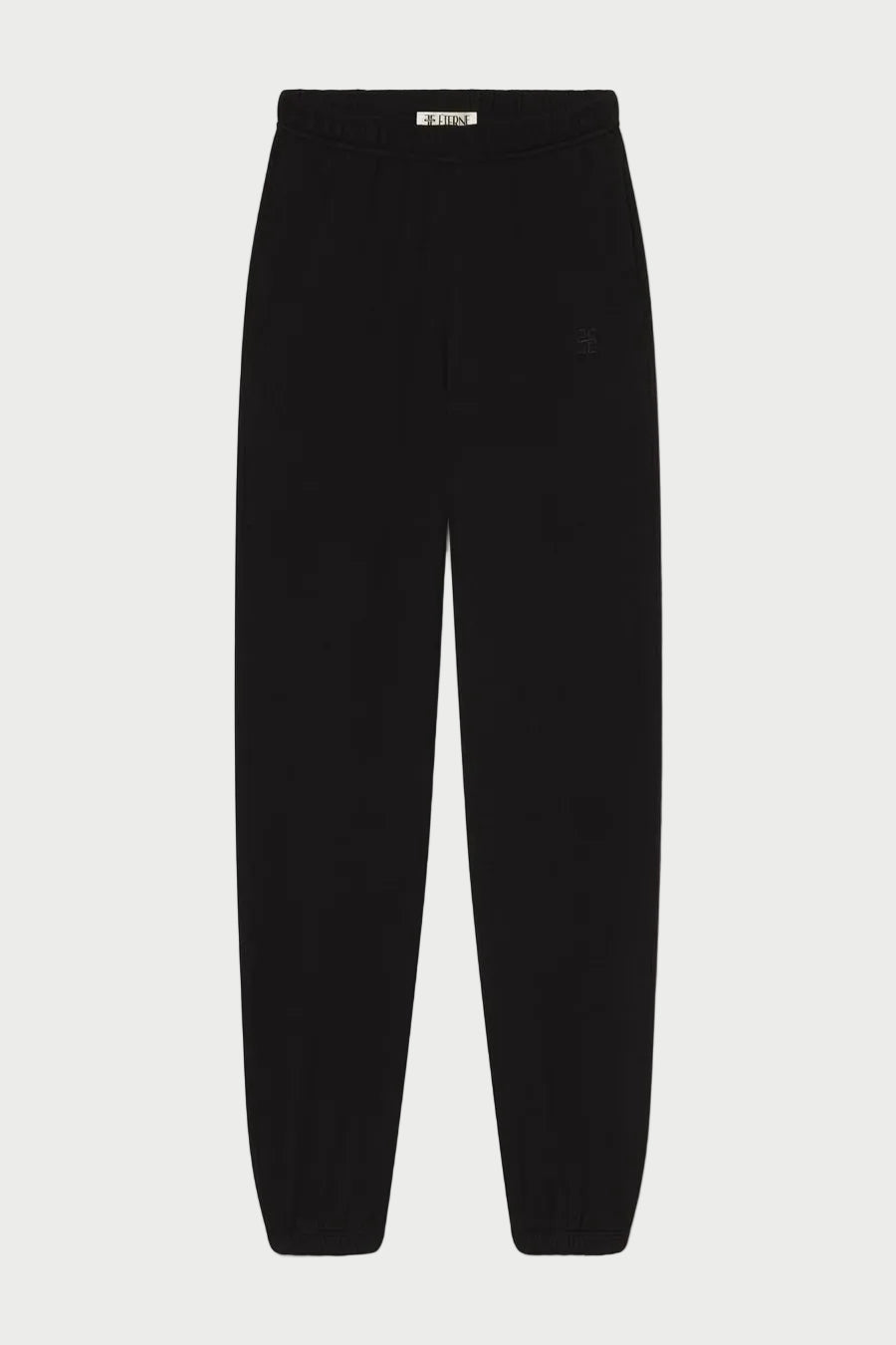 The Éterne Boyfriend Pocket Sweatpant by Eterne, in black French terry with an elastic waistband and cuffs, is displayed flat on a white background—an elevated loungewear essential featuring the relaxed fit of a classic boyfriend sweatpant.