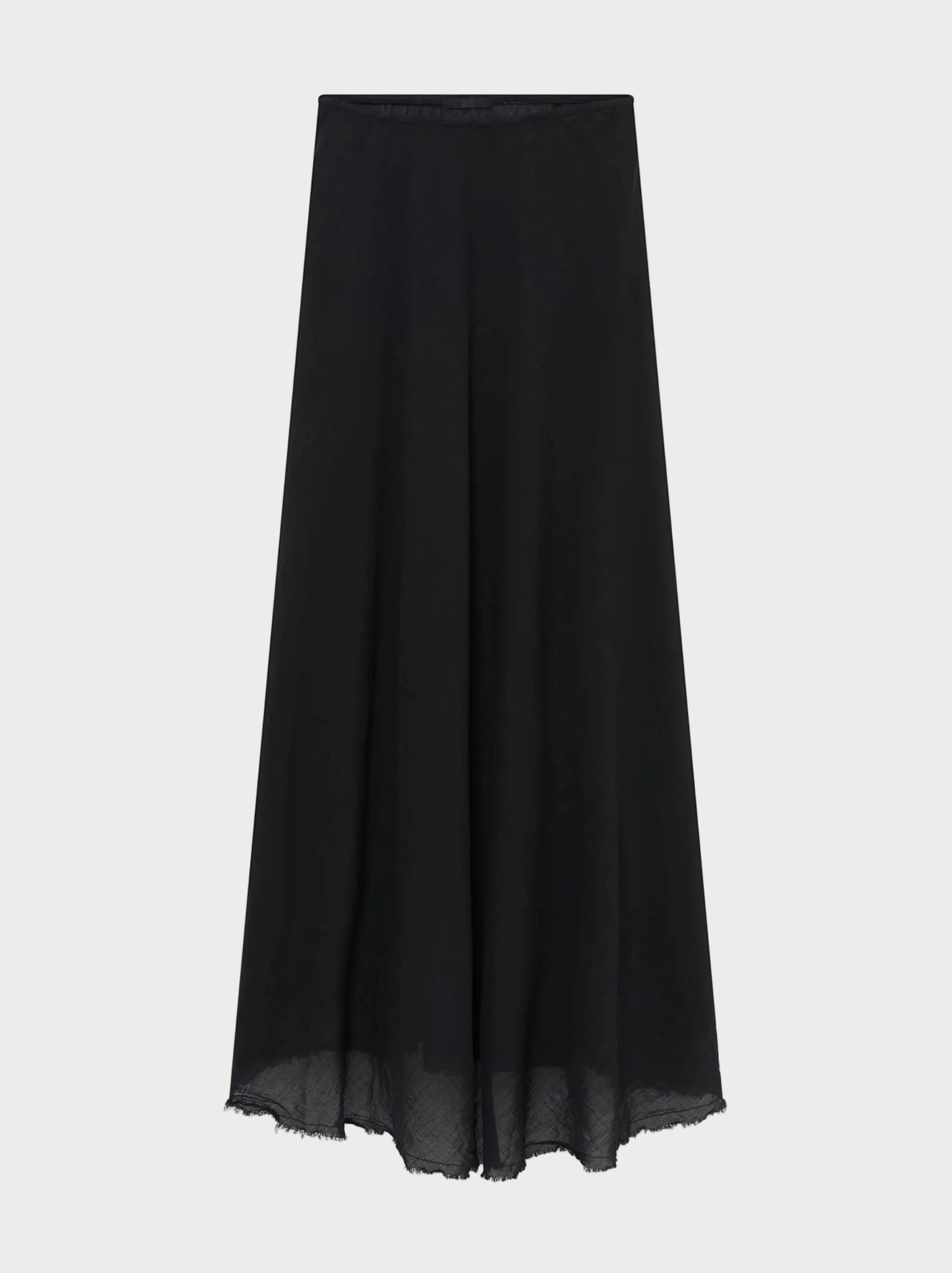 The All III Elysia Maxi Skirt by All III is a long, black, flowy A-line sheer maxi skirt crafted from lightweight fabric, featuring a clean waistband and an unfinished hem.