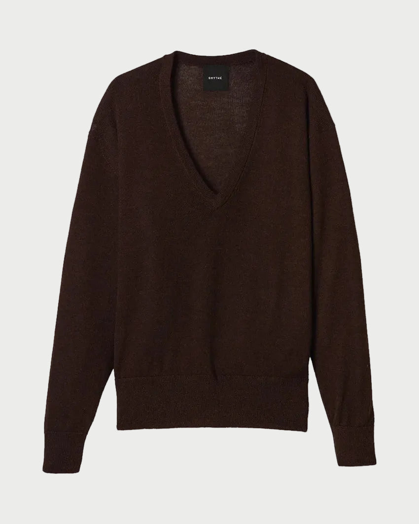 A dark brown V-neck knit sweater with long sleeves, displayed flat against a light gray background.