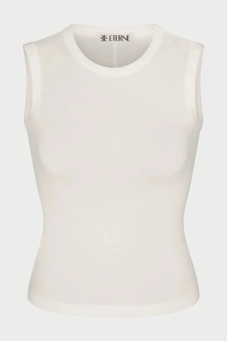 The Éterne Fitted Muscle Tank by Eterne features a sleeveless, slim fit silhouette with a crew neckline and subtle ribbed texture. Crafted from a soft cotton-modal blend, the label “ETERNE” appears inside the collar. Set against a plain white background.
