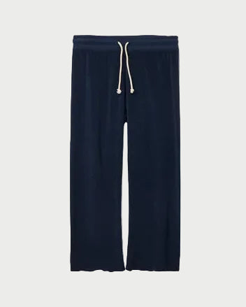 Navy blue sweatpants with a drawstring on a white background