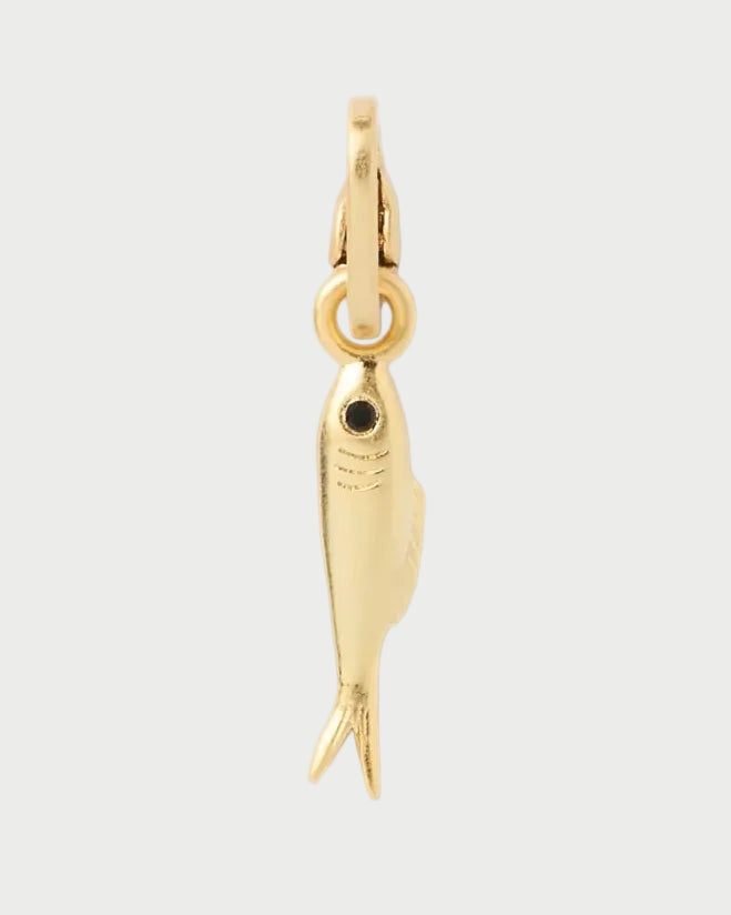 The CLARE V. Clare V. Sardine Charm features a small gold sardine with a black eye, hanging vertically from a circular gold loop—an ideal choice for anyone who loves distinctive, personalized jewelry.