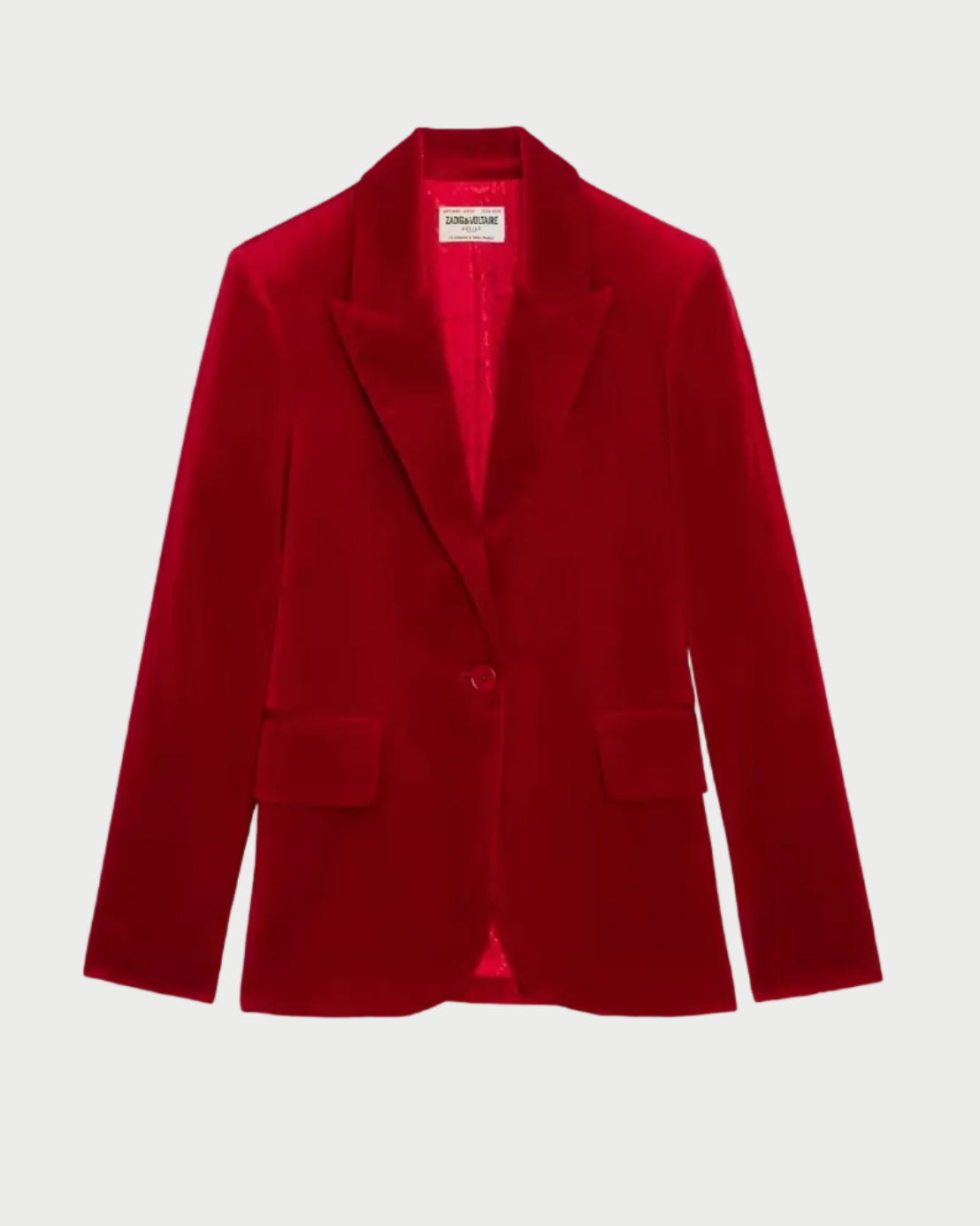 A vibrant red velvet blazer with notch lapels, a single button closure, and two front flap pockets, displayed against a clean white background.