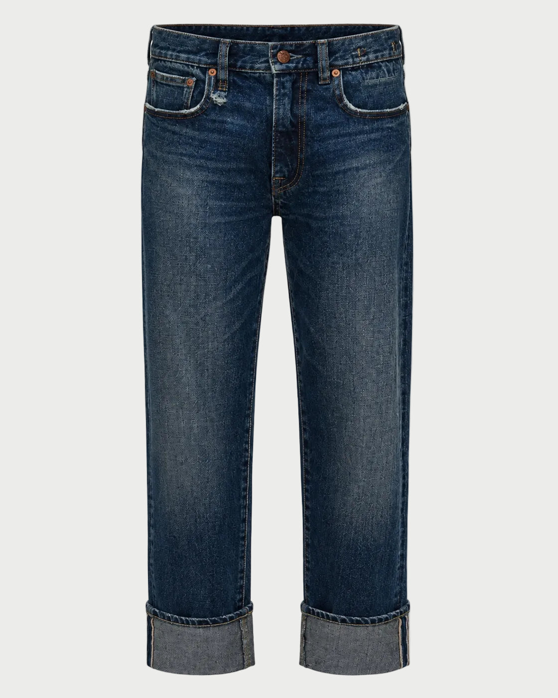 A pair of dark blue denim jeans with a straight-leg fit, featuring rolled cuffs and classic front pockets, shown against a light gray background.