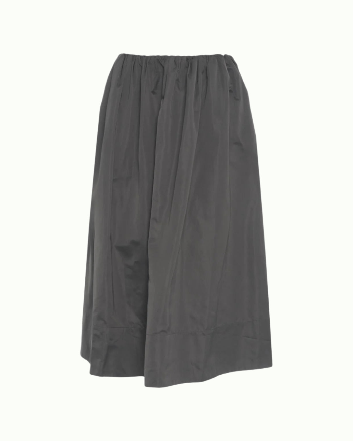 The Miss Skirt by Herskind is a loose-fitting, dark gray midi skirt featuring an elastic waistband, slightly flared silhouette, and lightweight, subtly shiny fabric for effortless style.