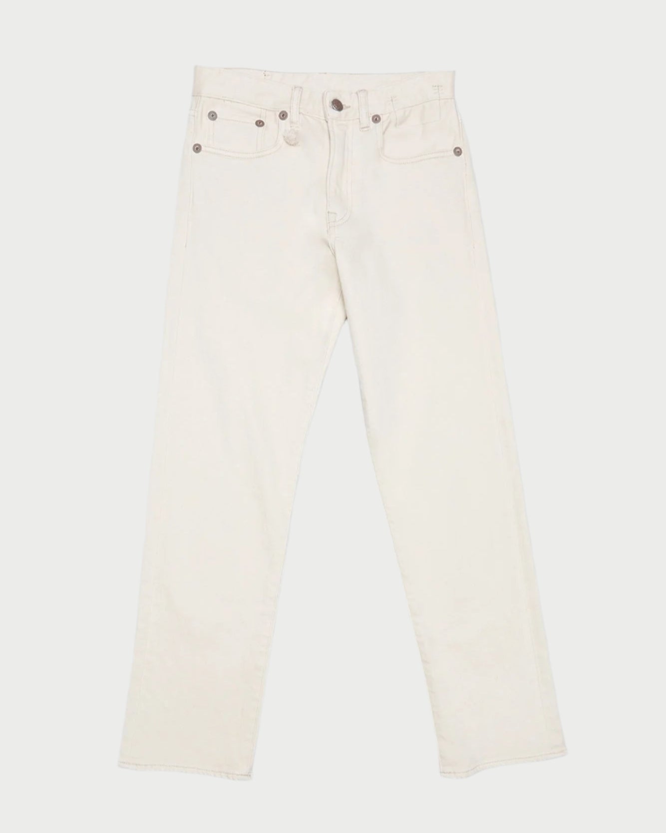 The R13 Romeo Jean in Ecru is a pair of slim boyfriend jeans made from Japanese comfort stretch denim, featuring a button and zip fly, two front pockets, and three back pockets. Shown here laid flat on a white background.