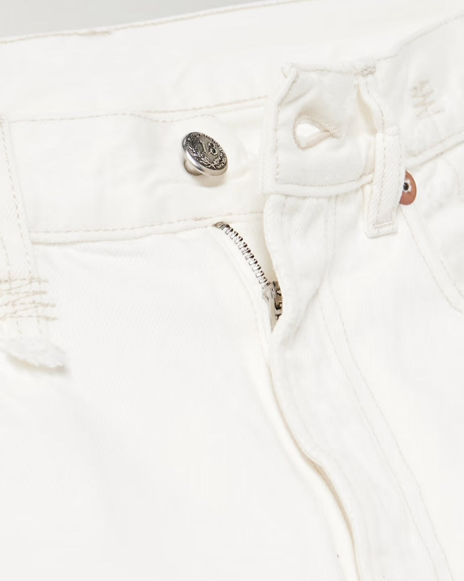Close-up of the waist on R13’s The Boyfriend Jean in Aerin White, with the top button fastened and zipper halfway open, highlighting detailed stitching and premium cotton denim texture.