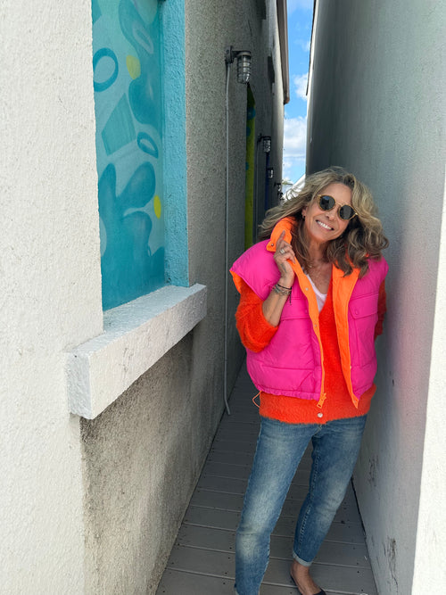 Chic Westport CT boutique owner, Kitt Shapiro, wearing bright colors by Essentiel Antwerp