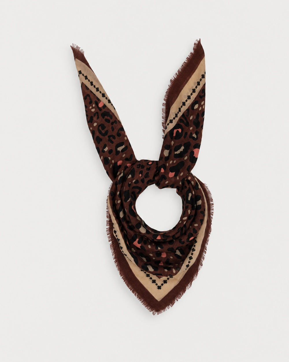 Maison Lecomte Flament Leo Chocolate Rosy scarf tied in a knot, showing its leopard print.