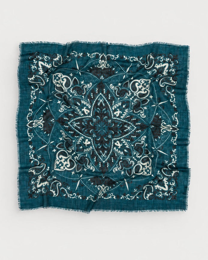 Maison Lecomte Flament Petrol square bandana scarf shown flat with its teal and ivory print.