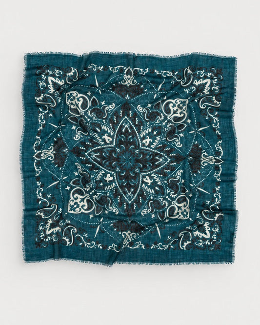 Maison Lecomte Flament Petrol square bandana scarf shown flat with its teal and ivory print.