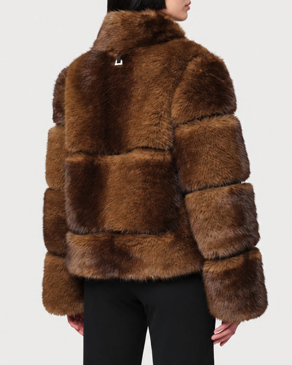 Side view of APPARIS Sai Coat in Mink with horizontal faux fur panels