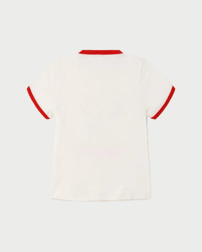 The RE/DONE Snoopy 60s Slim Ringer Tee by RE/DONE is a white short-sleeve shirt with red collar and sleeve cuffs, vintage-inspired like a classic ringer tee, shown from the back against a light gray background.
