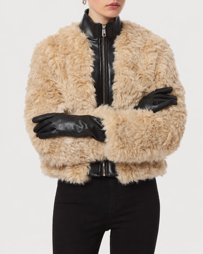 Close-up of APPARIS Lillet Bomber showing faux sherpa and contrasting SANS Leather trim