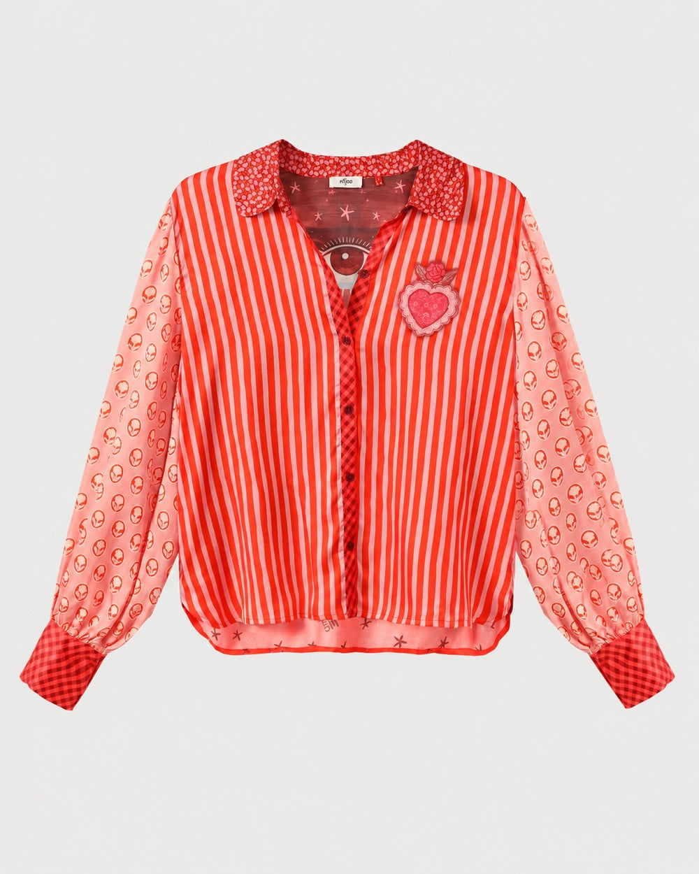 ME369 Sola Puff Sleeve Blouse Red Aura featuring red vertical stripes, balloon sleeves with an alien-face print, and a pink heart patch on the chest.