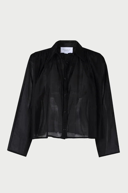 The Shirt Hayden Shirt Black is a sheer black cropped button-up shirt with a pointed collar and a swing silhouette.