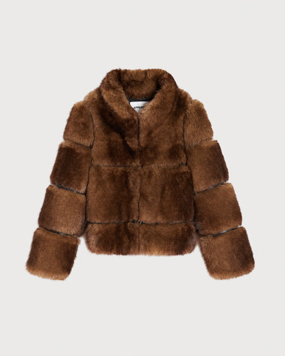 APPARIS Sai Coat in Mink shown off figure with tiered faux fur panels