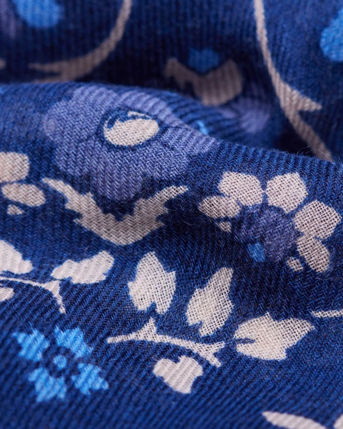 Close-up of the Maison Lecomte Flament Secret Garden scarf’s navy floral print.