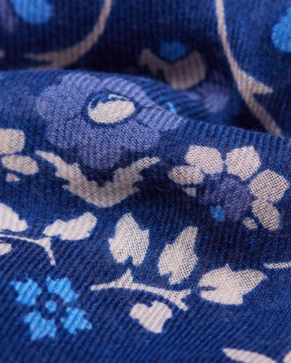 Close-up of the Maison Lecomte Flament Secret Garden scarf’s navy floral print.