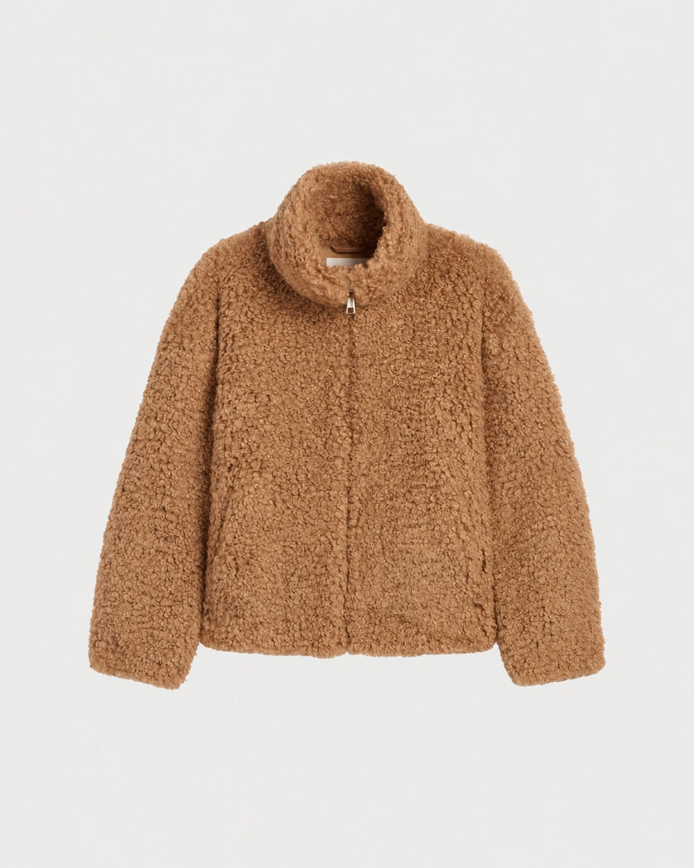 APPARIS Brooks Coat in Camel shown off figure with its zip front and high collar