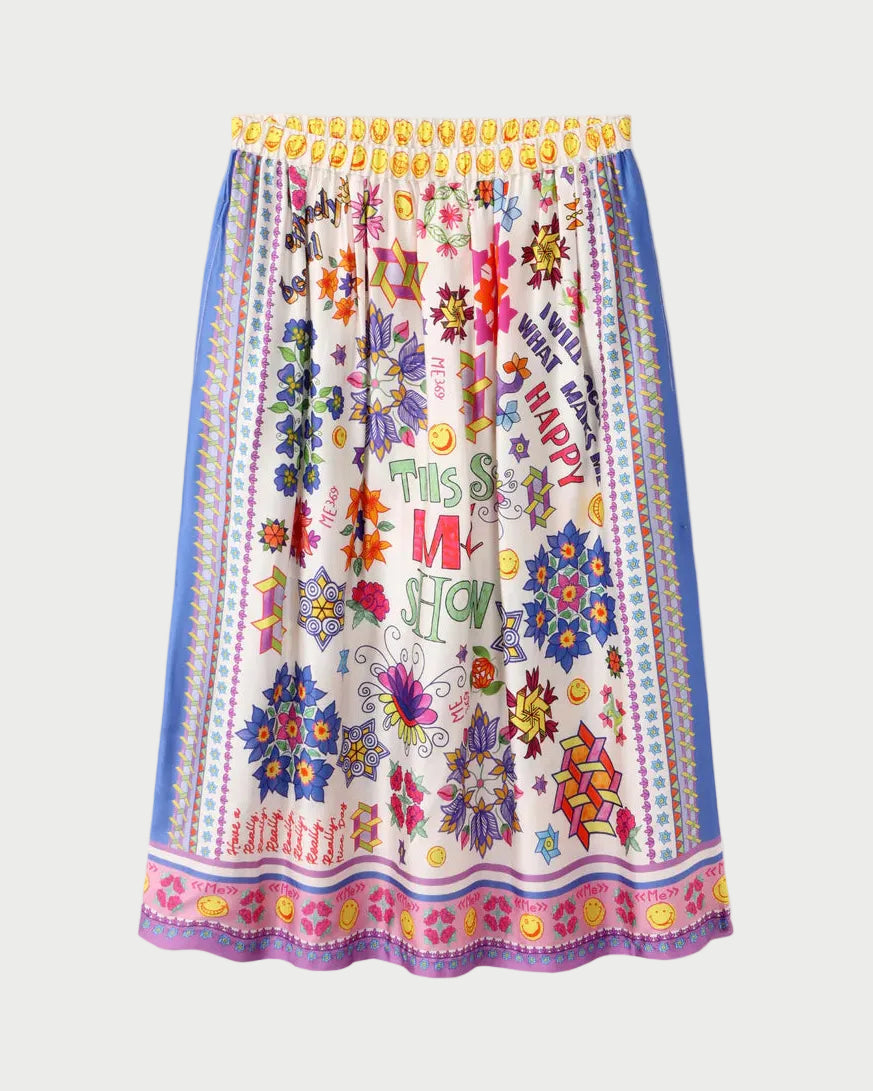 Colorful skirt with floral patterns and text on a white background