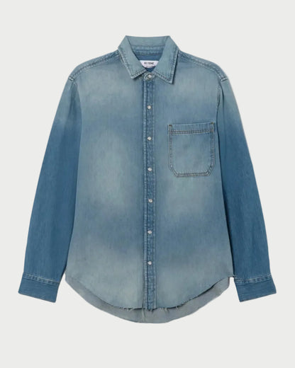 Blue denim shirt on a light gray background