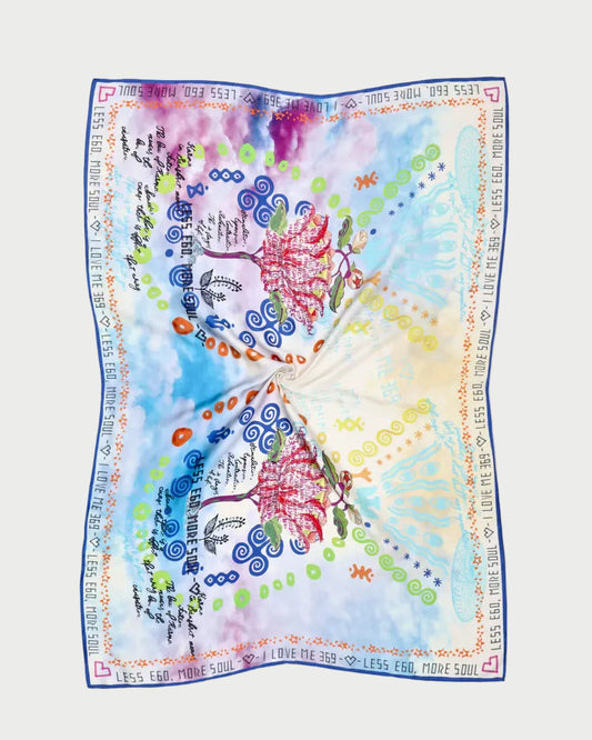 Colorful butterfly-themed fabric with intricate patterns on a white background