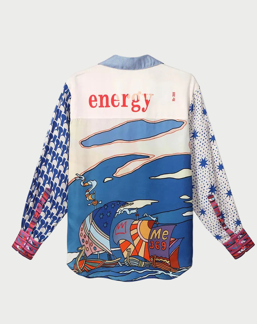 Colorful shirt with artistic design and text on a white background