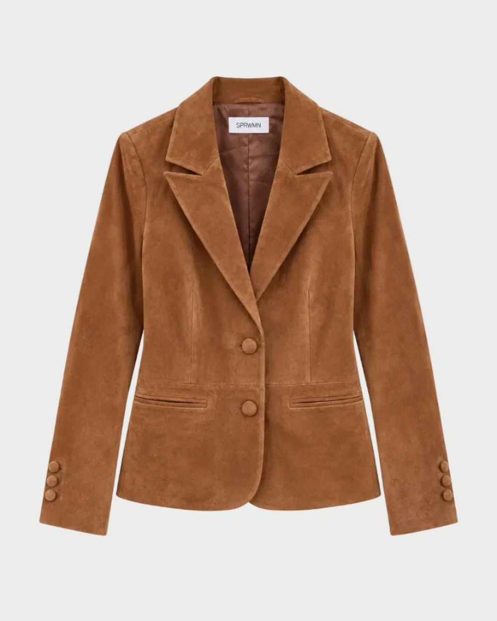 The SPRWMN Claire Suede Blazer by SPRWMN, featuring a brown suede construction with a notched collar, two front buttons, two front pockets, and three buttons on each sleeve cuff—expertly crafted with luxury tailoring—is displayed against a plain white background.