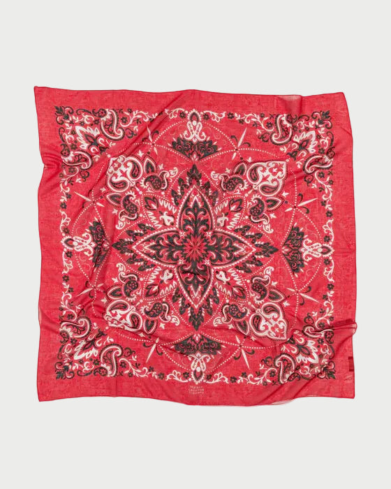 Red bandana with black paisley pattern on a white background