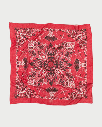 Red bandana with black paisley pattern on a white background