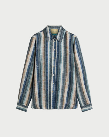 The Momoni Arles Shirt by Momoni is a long-sleeved, collared button-down made from printed silk twill with vertical stripes in blue, teal, beige, and white. It is shown on a plain white background.