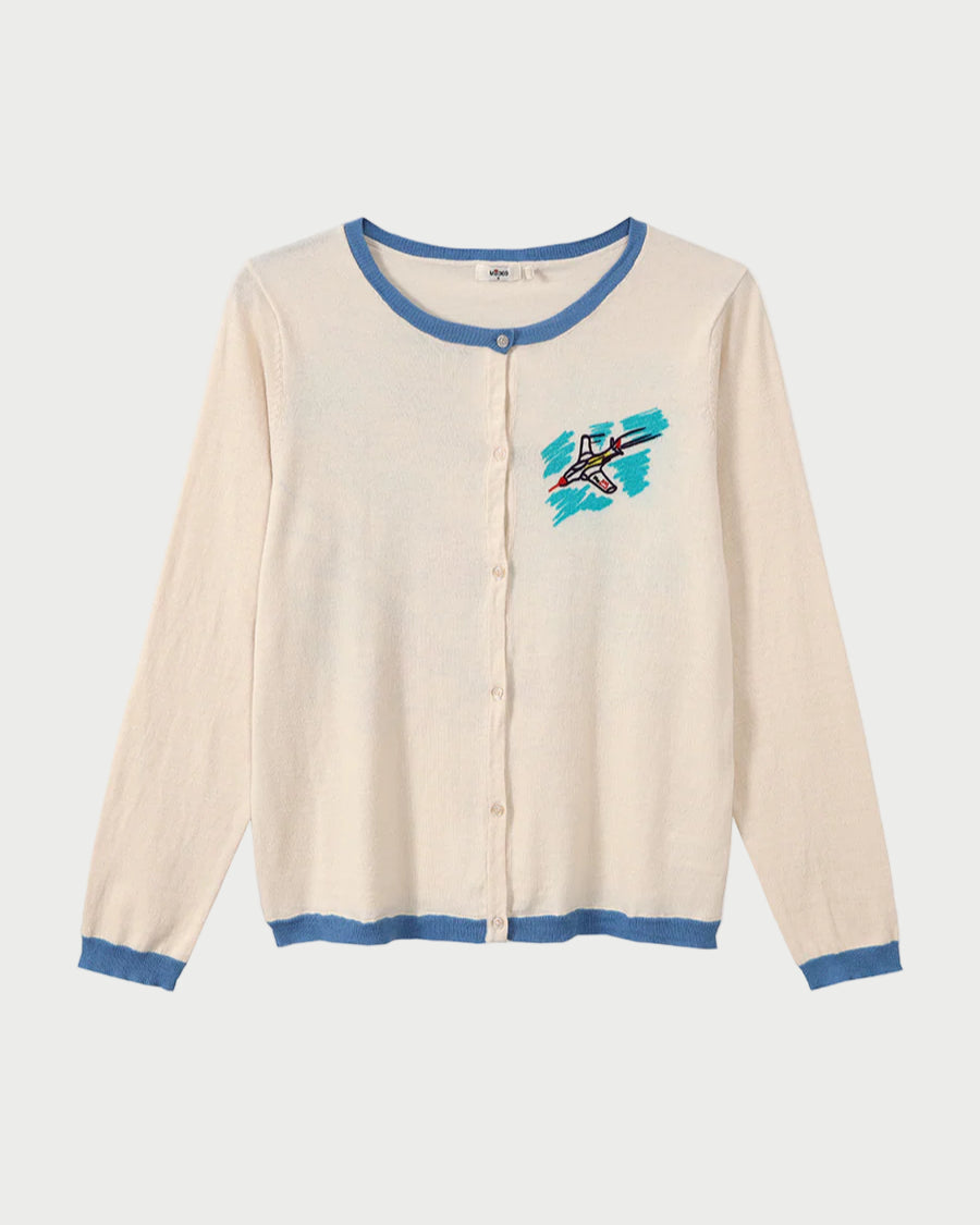 Beige cardigan with blue trim and a colorful graphic on a white background