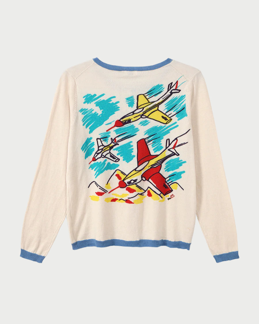 Beige sweater with colorful airplane design on a white background
