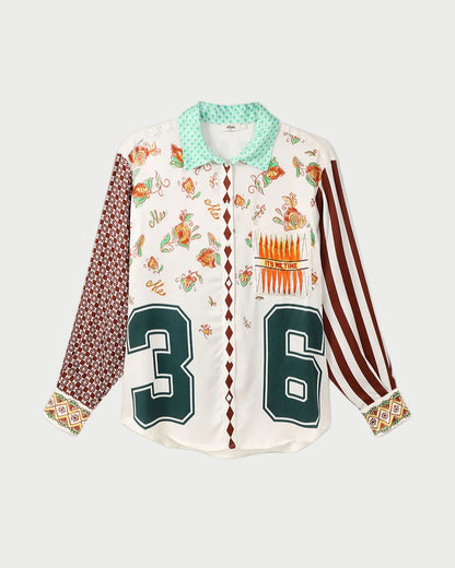 Colorful patterned shirt with numbers on a gray background