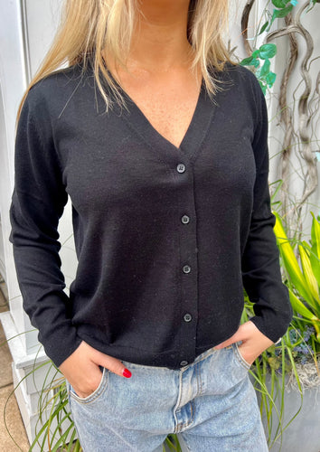 Black front button cardigan by One grey day available at west2westport.com