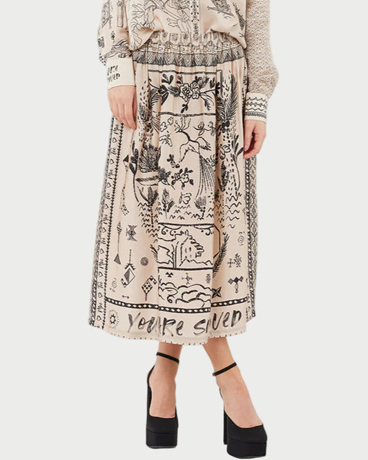 Woman wearing a patterned outfit on a white background