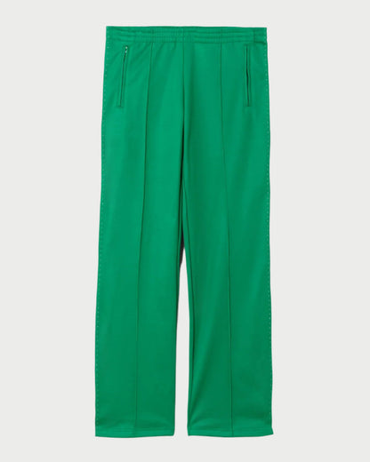 The RE/DONE Sunland Track Pant is a sporty, bright green straight-leg style with front vertical seams and two zippered hip pockets, shown laid flat on a plain white background.