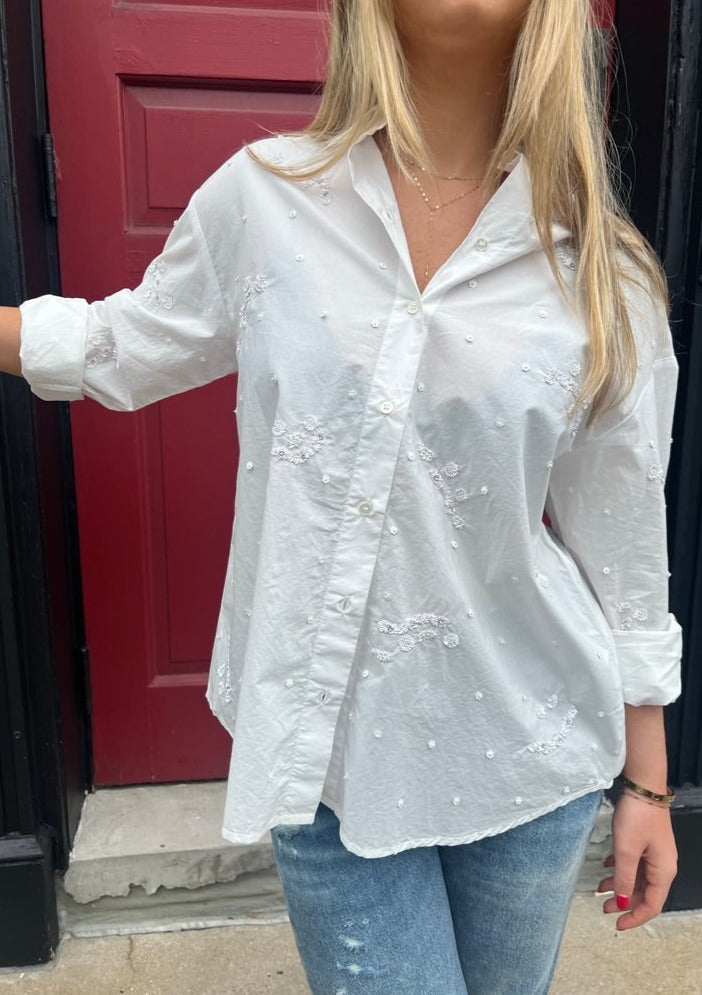 Embellished white button up top, available at west2westport.com