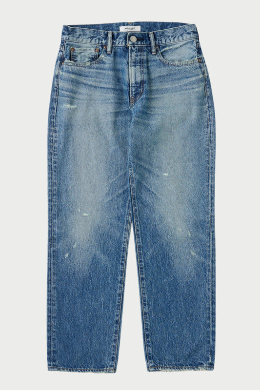 Blue jeans with slight distressing on a white background