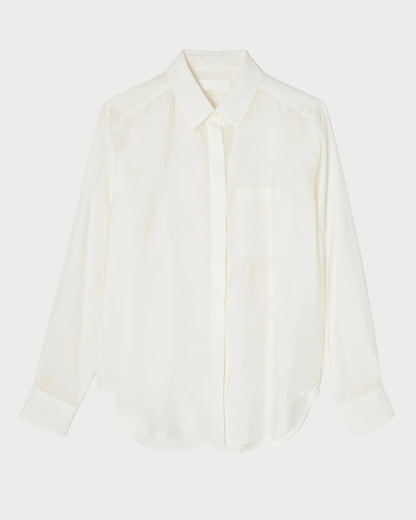 White blouse on a light gray background