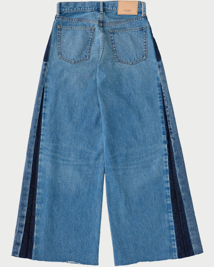 Blue jeans with a striped pattern on a white background