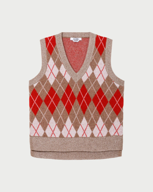 Argyle patterned sweater vest on a white background
