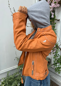 Orange leather jacket with hood, available at west2westport.com