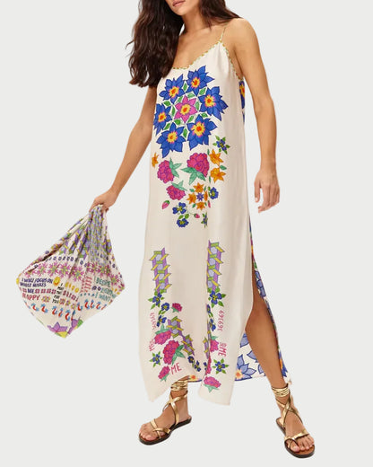 Woman wearing a floral dress holding a colorful bag on a white background