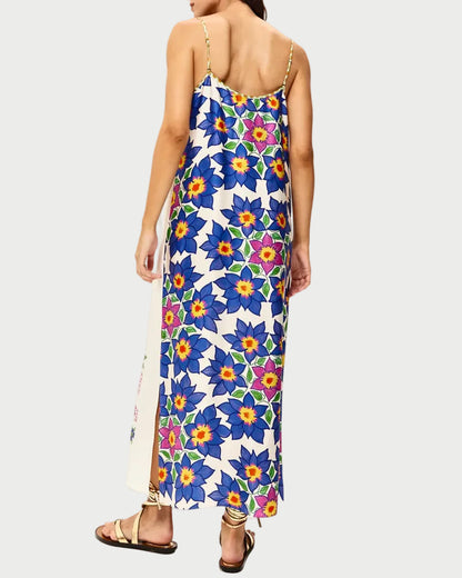 Woman wearing a floral dress with a white background